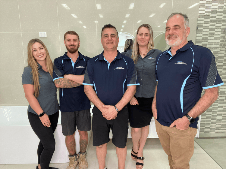 The Benco Bathrooms team smiling together 